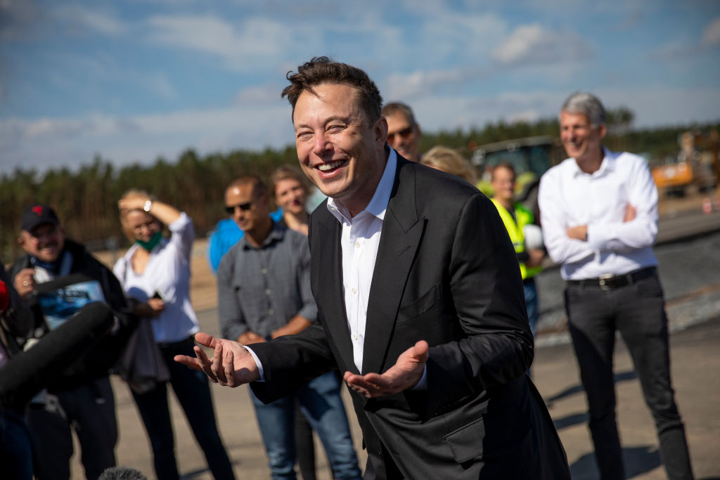 GRUENHEIDE, GERMANY - SEPTEMBER 03: Tesla head Elon Musk talks to the press as he arrives to to have a look at the construction site of the new Tesla Gigafactory near Berlin on September 03, 2020 near Gruenheide, Germany.  (Photo by Maja Hitij/Getty Images)