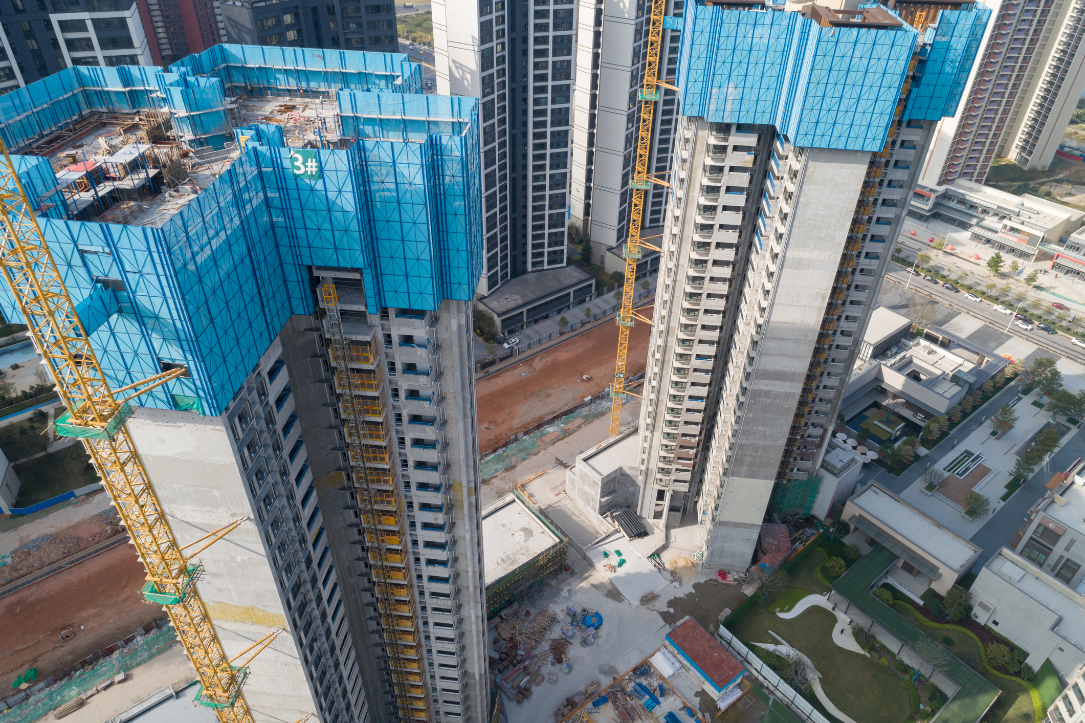 Aerial view of multi-storey apartment construction site in China. Credit: lzf/Getty Images