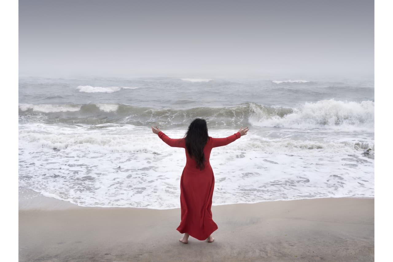 A still photograph from Marina Abramović’s Performance for the Oceans, filmed earlier this year on Fire Island, N.Y. Photograph by Marco Anelli © INSTAGRAM: @marco_anelli_studio